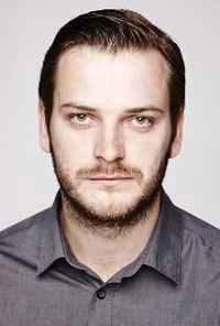 Tom J.